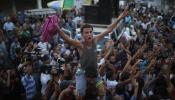 Los gazatíes celebran su "victoria" en las destruidas calles de la Franja