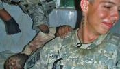 Soldados de EEUU se divierten posando con cadáveres afganos