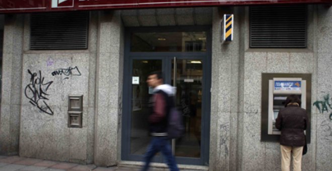 Popular revisa su previsión de beneficios por la situación económica