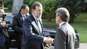 Rajoy pide "más integración y menos fronteras" tras un frío saludo a Mas