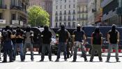 Fernández Díaz condecora a los policías que blindaron Barcelona durante la cumbre del BCE