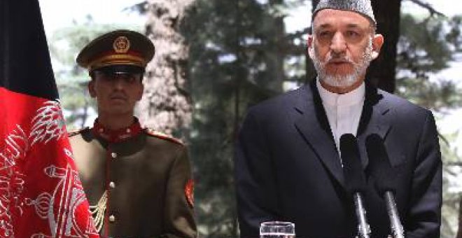 Karzai preside el funeral por su hermanastro asesinado