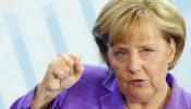 Merkel no se inmuta ante el revés electoral