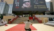 Cannes y sus habitantes abren sus brazos al cine entre flores y carteles
