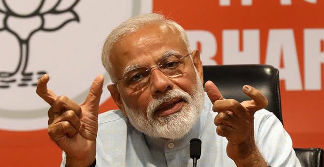 Las encuestas a pie de urna pronostican una victoria del primer ministro Modi en la India
