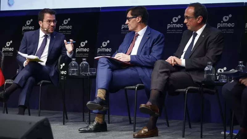 Los candidatos del PSC, Salvador Illa (c); ERC, Pere Aragonès (i) y de Junts, Josep Rull (d); durante un debate preelectoral organizado por la patronal PIMEC.