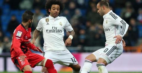 Marcelo, durante el partido ante el Sevilla. EFE/Alberto Martín