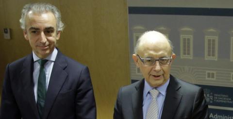 El ministro Cristóbal Montoro con el secretario de Estado de Hacienda, Miguel Ferre, y el de Administraciones Públicas, Antonio Beteta. EFE