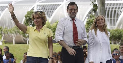 Aguirre, Rajoy y Cifuentes, tras llegar a la meta del Parque de Arganzuela. / REUTERS