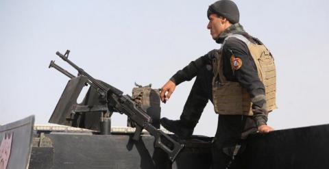 Un miembro de las fuerzas de seguridad de Irak en la base militar de Al Habaniya. - AFP