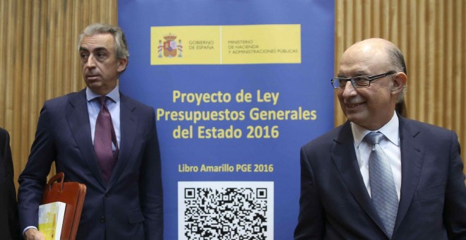 El ministro de Hacienda, Cristóbal Montoro ,con el secretario de Estado de Hacienda, Miguel Ferré, y el secretario de Estado de Administraciones Públicas, Antonio Beteta, en la presentación de los PGE. EFE