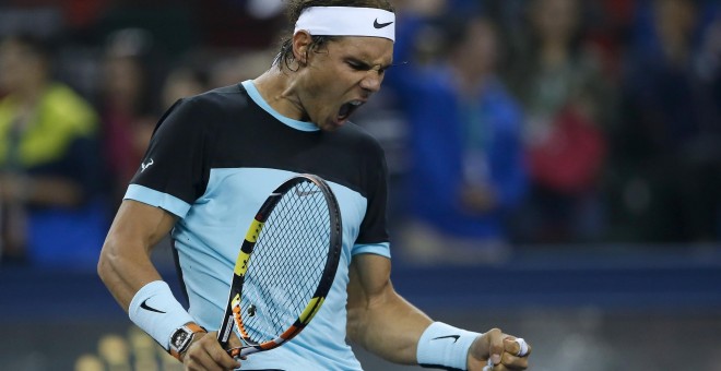 Rafa Nadal celebra un punto ante Karlovic. /REUTERS