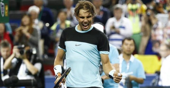 Rafa Nadal celebra su victoria contra el canadiense Raonic. /EFE