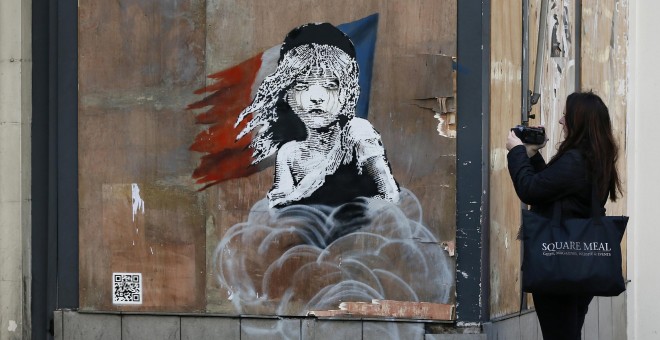 Nuevo grafiti de Banksy denuncia las condiciones de los emigrantes en la 'jungla' de Calais./REUTERS