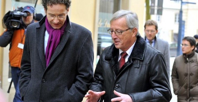 Juncker, Presidente de la Comisión Europea, y Dijsselbloem Presidente del Eurogrupo.- EFE