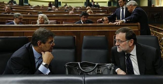 Rafael Catalá junto a Mariano Rajoy en el Congreso de los Diputados. /.EFE