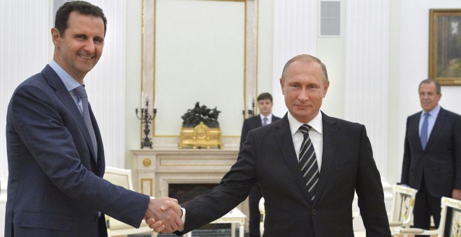 El presidente sirio Bashar al-Assad y el presidente ruso, Vladimir Putin, en un encuentro en el Kremlin en octubre de 2015. REUTERS/Alexei Druzhinin/RIA Novosti/Kremlin