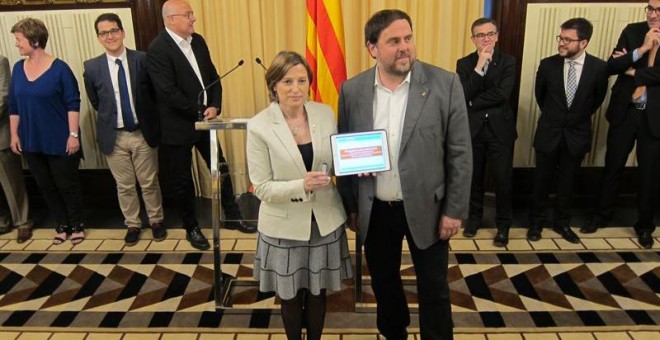 Oriol Junqueras y Carme Forcadell durante el acto de este martes.- EP