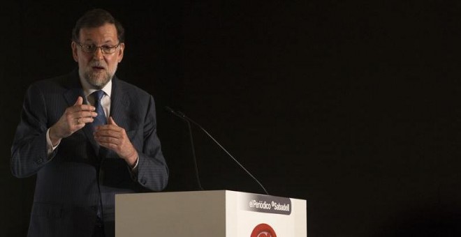 El presidente del Gobierno en funciones, Mariano Rajoy, en un desayuno informativo en Barcelona. EFE/Quique García