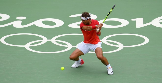 Rafa Nadal disputando un partido en el centro olímpico de tenis. /REUTERS