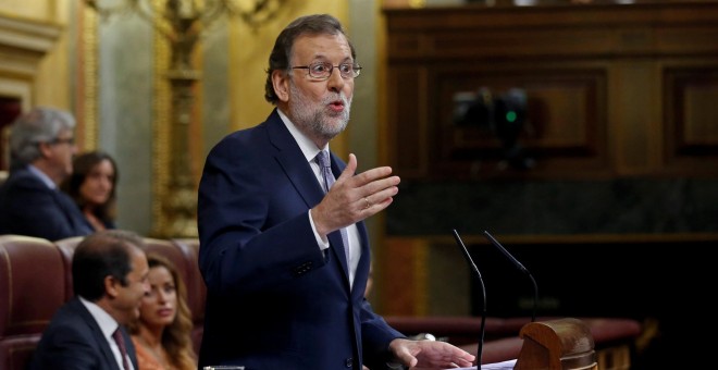 El presidente del Gobierno en funciones, Mariano Rajoy, durante una de sus intervenciones en el debate de investidura de este miércoles en el Congreso de los Diputados.- REUTERS