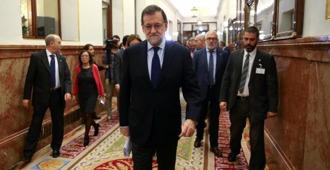 Mariano Rajoy, presidente del Gobierno, llega al Parlamento. / REUTERS