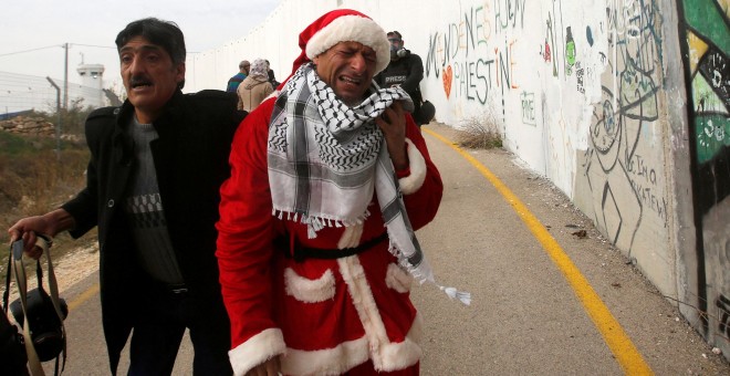 Un manifestante palestino en unas protestas en Belén el 23 de diciembre / REUTERS