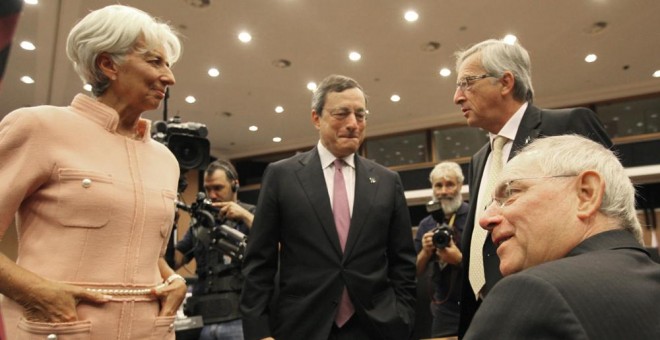 Christine Lagarde, Mario Draghi y Jean-Claude Juncker en una reunión informal del Eurogrupo en Nicosia (Chipre). AFP/ Yiannis Kourtoglou