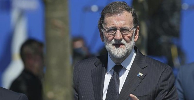 El presidente del Gobierno español, Mariano Rajoy, a su llegada a la sede de la OTAN para asistir a la reunión de líderes de la Alianza que se celebra este jueves en Bruselas (Bélgica). EFE/Stephanie Lecocq