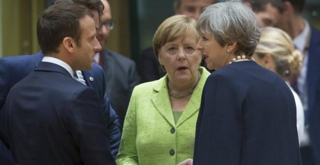 Macron, Merkel y May, hoy en Bruselas. EFE/Olivier Hoslet