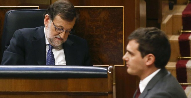 El presidente del Gobierno, Mariano Rajoy, y el líder de Ciudadanos, Albert Rivera, en el Congreso. Archivo REUTERS