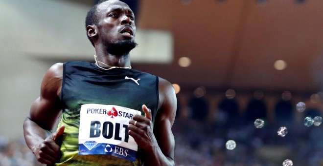El atleta jamaicano Usain Bolt corriendo los 100 metros en la IAAF Diamond League Herculis en Monaco /REUTERS (Eric Gaillard)