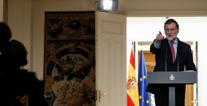 El presidente del Gobierno, Mariano Rajoy, durante la rueda de prensa tras la última reunión del Consejo de Ministros en 2017. REUTERS/Juan Medina