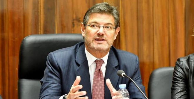 El ministro de Justicia, Rafael Catalá, defendiendo que Carles Puigdemont no puede ser candidato a presidente de la Generalitat porque una persona 'que está huida de la justicia' no puede 'ser candidata a nada'. EFE