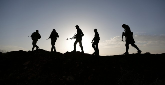Combatientes del ejército sirio. REUTERS/Khalil Ashawi