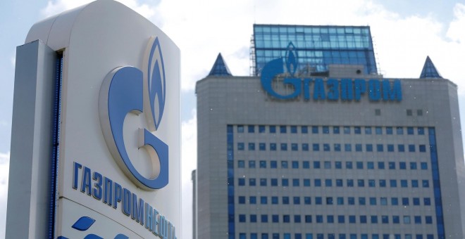 A board with the logo of Gazprom Neft oil company is seen at a fuel station in Moscow, Russia, May 30, 2016. REUTERS/Maxim Zmeyev