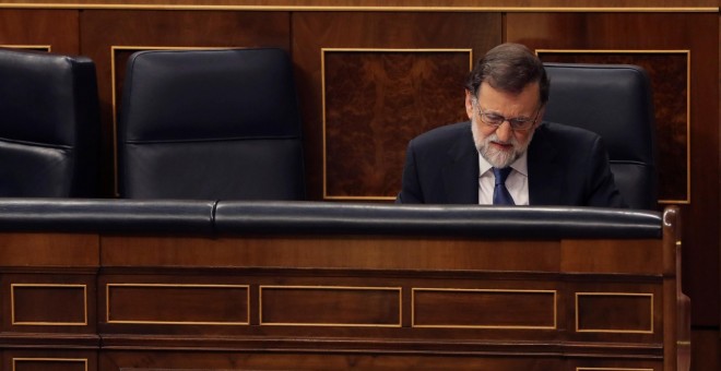 El presidente del Gobierno, Mariano Rajoy, durante la sesión plenaria sobre las pensiones en el Congreso de los Diputados. EFE/ Ballesteros