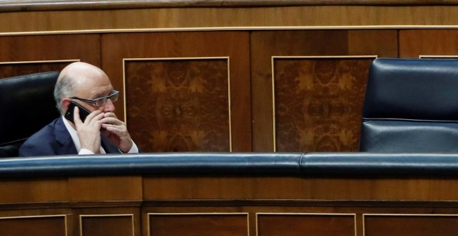 El ministro de Hacienda y Función Pública, Cristóbal Montoro,  en el Congreso de los Diputados durante el debate de los Presupuestos Generales del Estado para 2018. EFE/ Fernando Alvarado