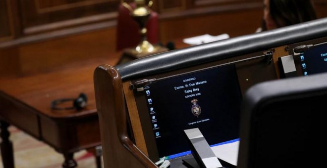 El asiento de Rajoy en el Congreso, vacío. (SUSANA VERA | EFE)