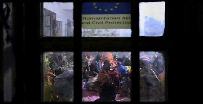 Refugiados en el centro de detención de Zawiy. / RICARDO GARCÍA VILANOVA