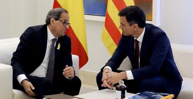 El presidente del gobierno Pedro Sánchez y el president de la Generalitat Quim Torra, durante la reunión de este lunes. /EFE