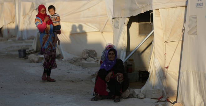 Mujeres en un campo de refugiados en Idlib, Siria. REUTERS/Khalil Ashawi