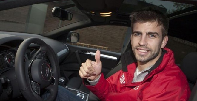 Gerard Piqué, al volante de un coche Audi en un acto publicitario con el Barcelona.