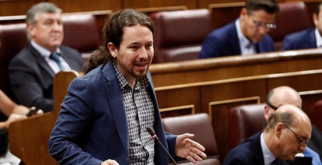 El secretario general de Podemos, Pablo Iglesias, interviene en la sesión de control al Gobierno hoy en el Congreso. EFE/Mariscal