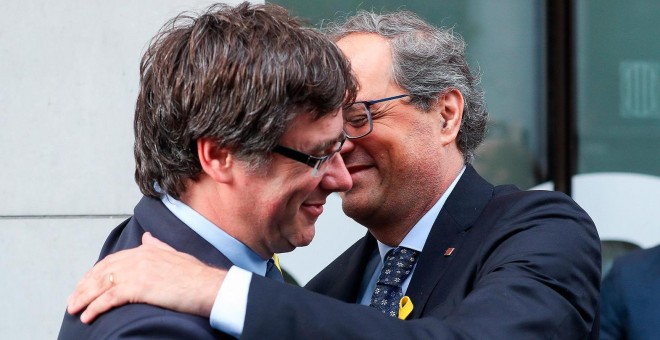 Imagen de archivo de Carles Puigdemont y Quim Torra en Bruselas/EFE