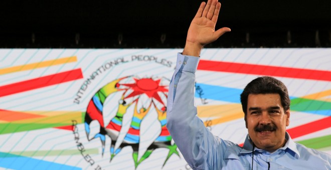 Nicolás Maduro, asiste a una reunión con representantes internacionales en apoyo de su gobierno en Caracas. / REUTERS