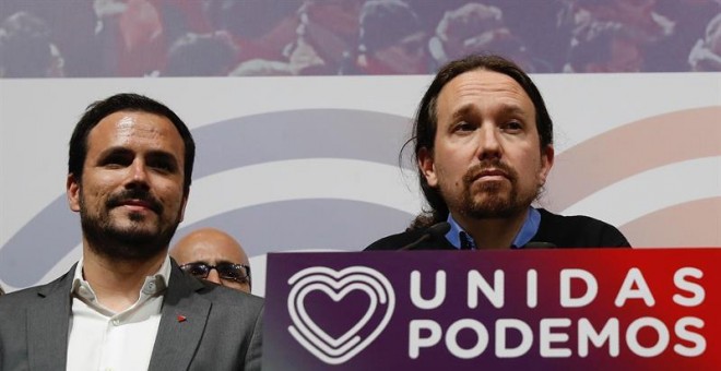 El candidato de Unidas Podemos, Pablo Iglesias (d), junto al coordinador federal de IU, Alberto Garzón. - EFE