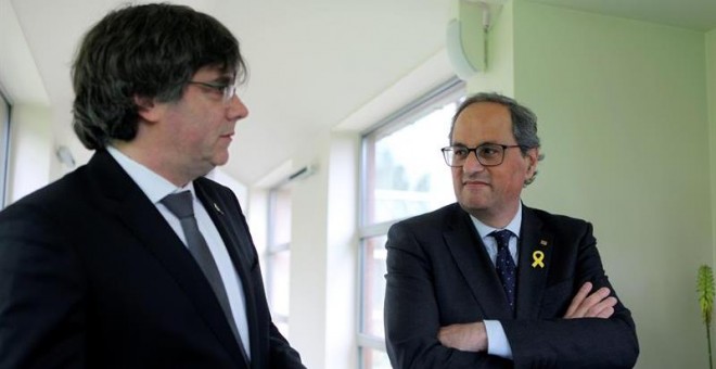El presidente de la Generalitat, Quim Torra y el expresidente catalán Carles Puigdemont. EFE