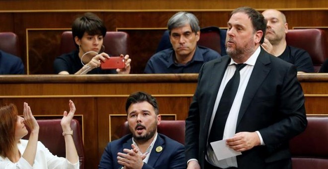 Oriol Junqueras, cuando ha intentado pronunciar su mensaje. - EFE