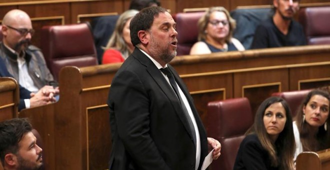 21/5/2019.-El líder de ERC, Oriol Junqueras, que se encuentra en prisión provisional, promete el cargo durante la sesión constitutiva de las nuevas Cortes Generales de la XIII Legislativa que se celebra este martes en el Congreso de los Diputados.EFE/Guil